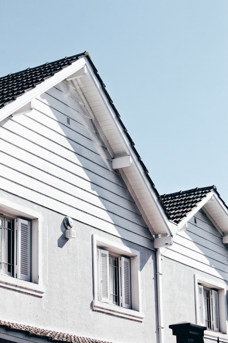 wooden house during day, home insurance